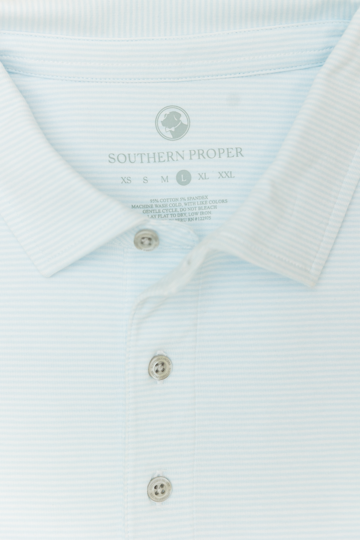 A close up of a lightweight Tensaw Stripe Polo polo shirt with the words southern professional on it.