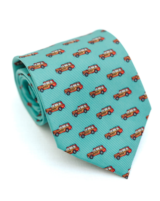 A Wagoneer Necktie: Teal featuring a car print.