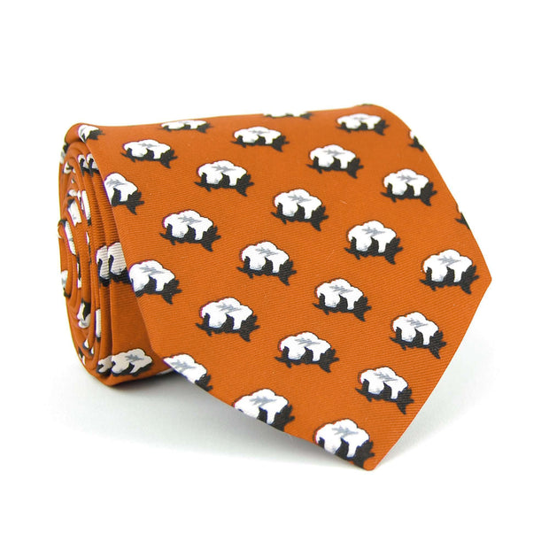 A Cotton Boll Tie: Burnt Orange with black and white zebras on it, perfect for the Cotton Pickin' Gent or Southern Proper style.