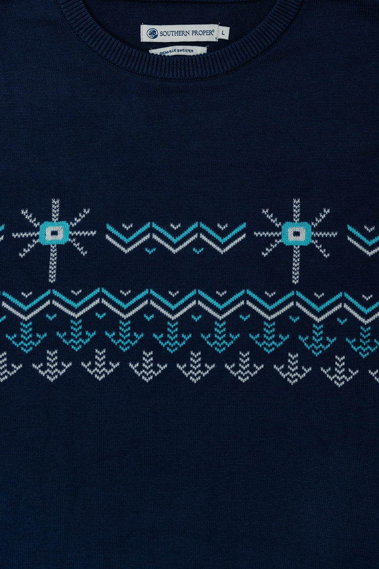 A Bienville Sweater with a snowflake design on it.