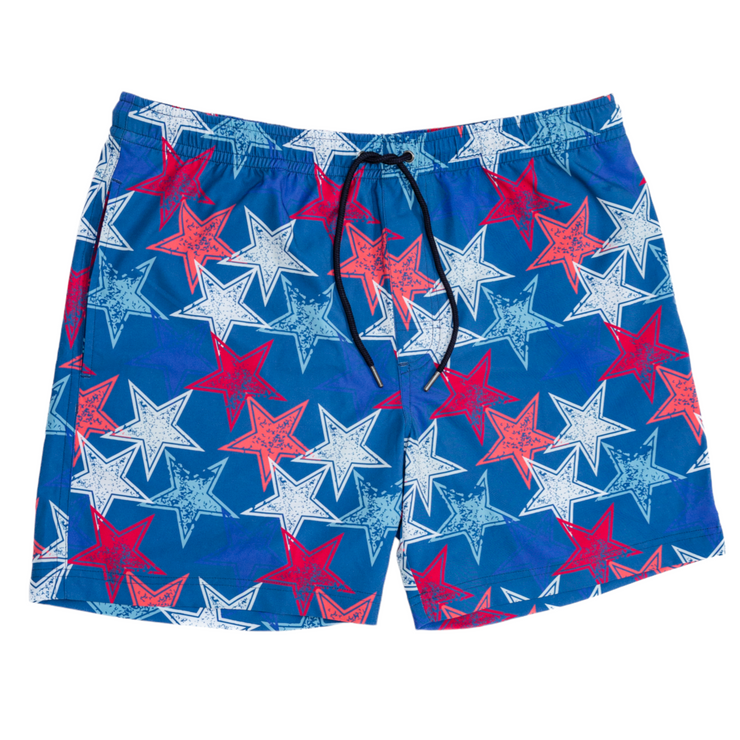 A blue and red Vintage Stars Swim: Proper Navy swim trunk from the Spring 23 Keys collection.