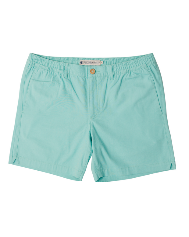 The PC Short: Aegean swim shorts, embodying the aesthetics of Southern Proper, feature an embroidered logo in a mint green color.