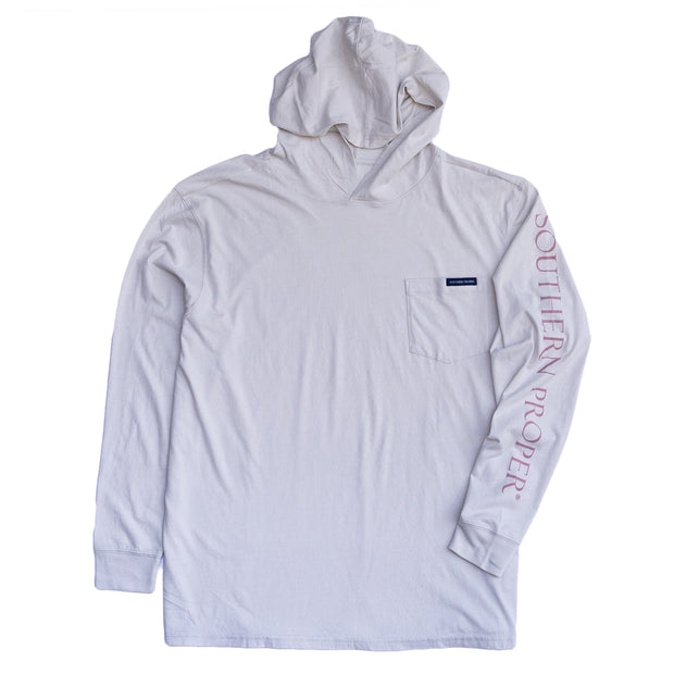 A white Hoodie Tee: Proper Grey with a pink logo on it.