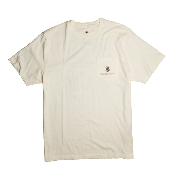 A Southern Comforts SS Tee Bone made with a Peruvian cotton blend, featuring a printed front pocket and brown logo.