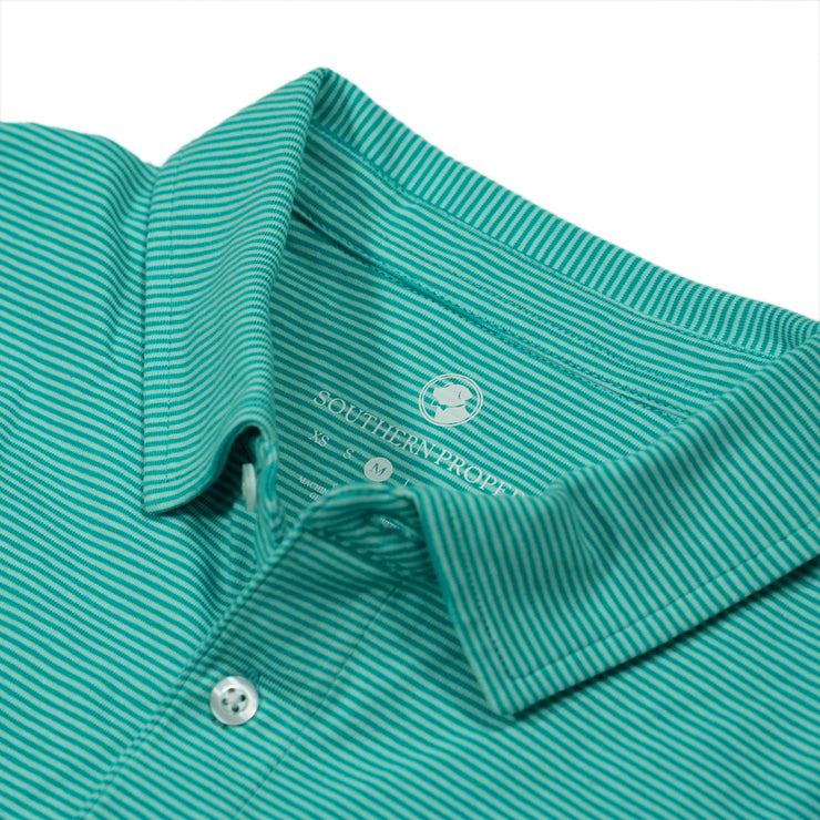 A close up of a lightweight Tensaw Stripe Polo.