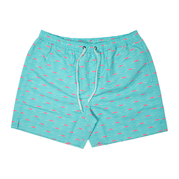A Southern Swim 5.5" inseam turquoise swim trunks with pink and blue flamingos on it, giving off a retro wave vibe.