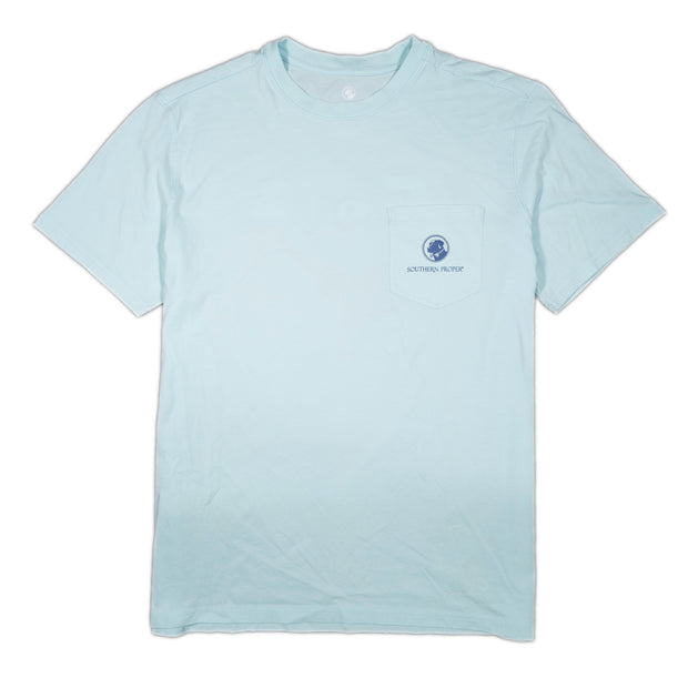 A soft light blue Retro Shade Dog short sleeve tee with a printed blue logo on it.