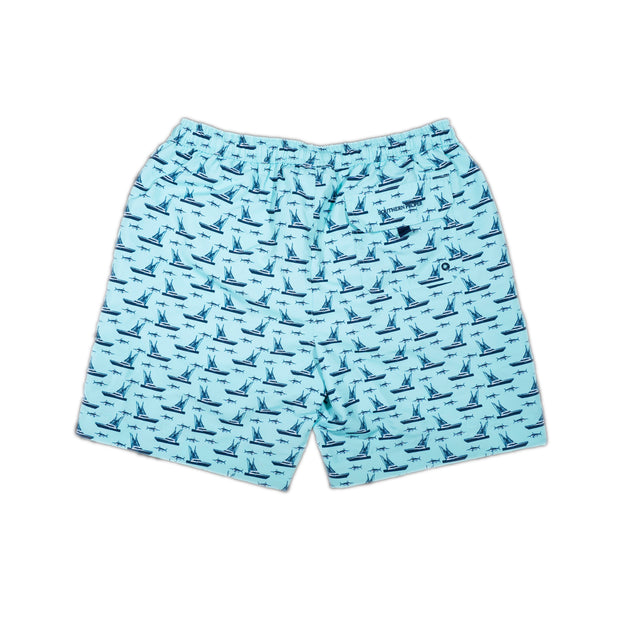 A boy's swim trunks with the Southern Swim 7.5": Chasing Blues pattern.