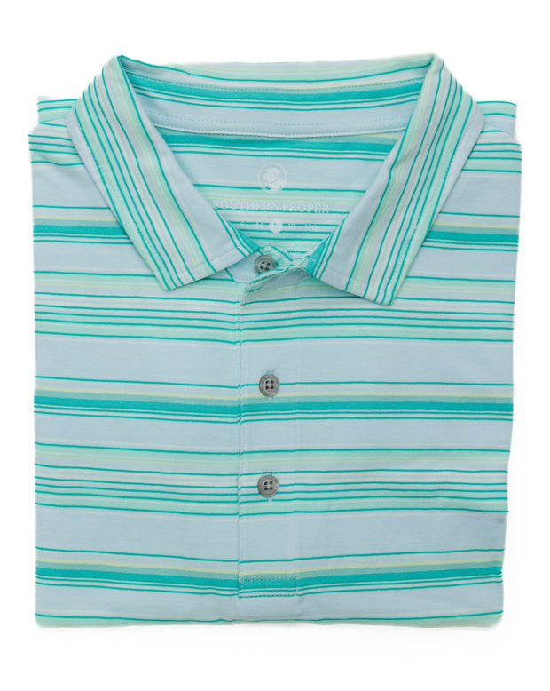 The men's Southwest-inspired Guadalupe Stripe Polo in a soft blue and white striped design.