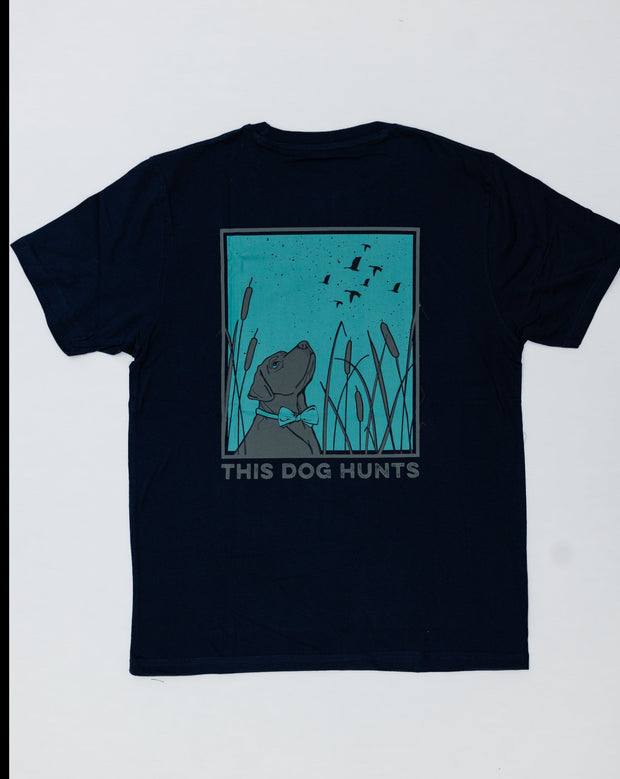 The This Dog Hunts SS Tee is made with a Peruvian cotton blend and features a dog hunting motif.