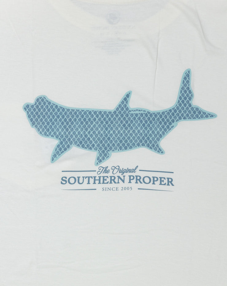 A Tarpon Scales SS Tee white t-shirt with a shark printed on the front pocket.