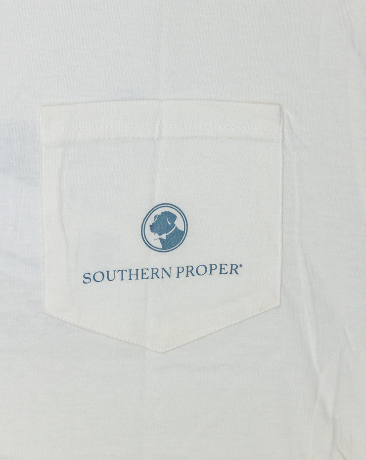 A Tarpon Scales SS Tee with the Southern Proper logo printed on the front pocket.