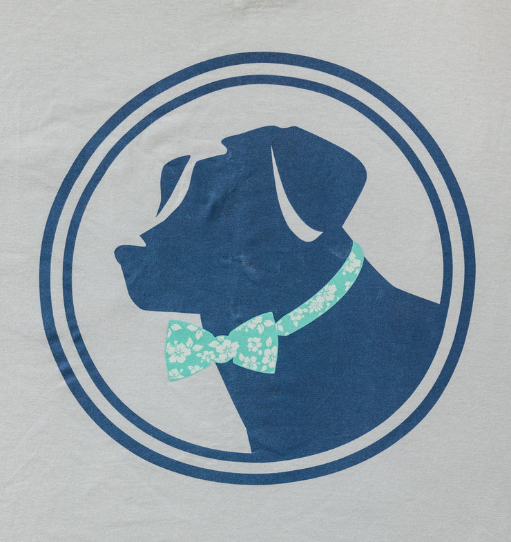 A Southern Proper Tropical Lab SS Tee made from a Peruvian cotton blend, featuring a dog wearing a bow tie.