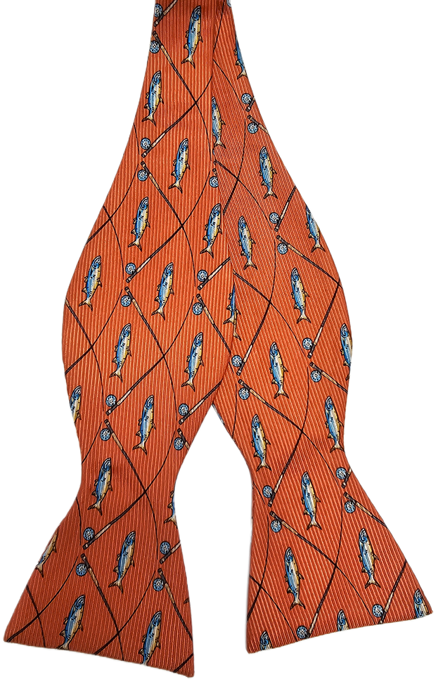 The Fly Fishing Bow: Salmon features orange patterned silk in a salmon hue, with diagonal stripes, blue fish motifs inspired by fly fishing, and classic circular designs—a nod to Southern Proper’s timeless style.