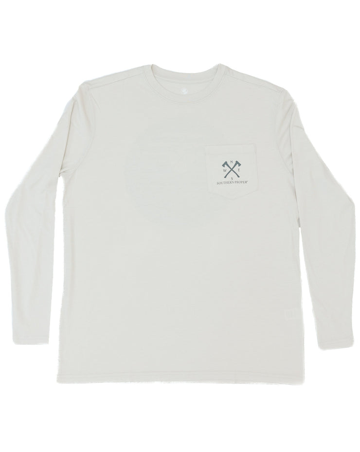 A white Walk in the Woods LS Tee - Proper Grey with a cross printed logo on it.