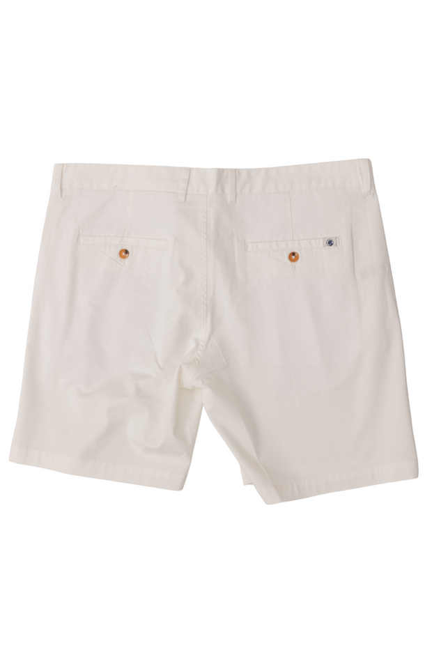 A pair of Bluff Shorts: White with buttons on the side made of cotton.