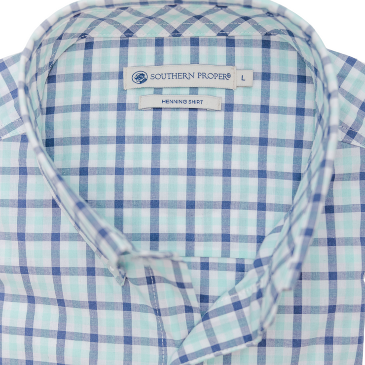 A blue checkered Henning Shirt: Freret.
