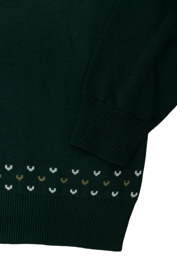 A Bienville sweater with embroidered hearts and the SP Logo on it, perfect for dressing up.