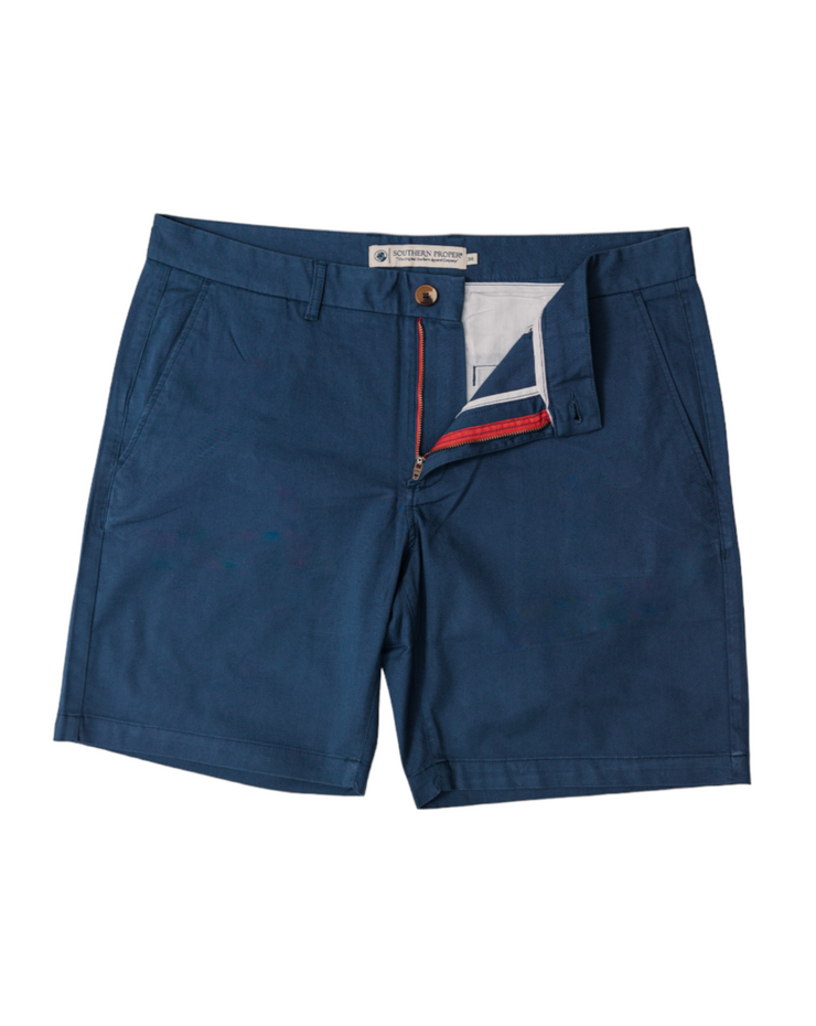 The men's navy chino shorts are made of cotton and feature a flattering inseam. These Bluff Twill Shorts: Proper Navy are perfect for a casual yet stylish look.