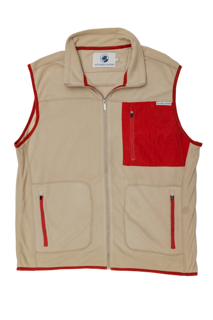 The All Prep Vest in tan and red is perfect for the golf swing.