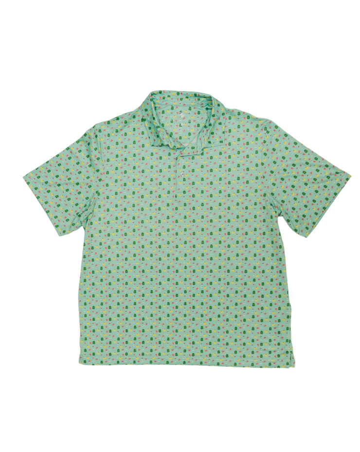 An Azalea Printed Performance Polo with printed polka dots made with moisture-wicking fabric.