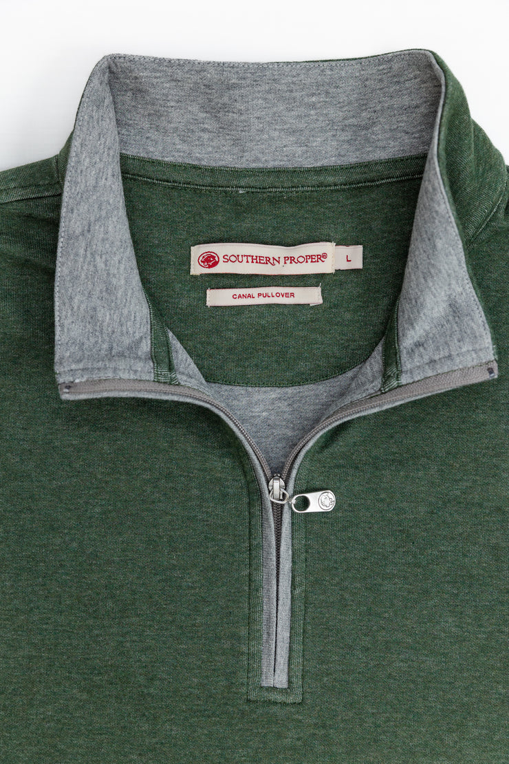 A men's green Canal Quarter Zip pullover sweater with a grey zipper.