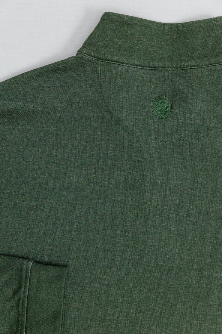 The Canal Quarter Zip is a new addition to our collection of Quarter-Zip Pullovers. This trendy green polo shirt features a stylish design on the back, making it a must-have.