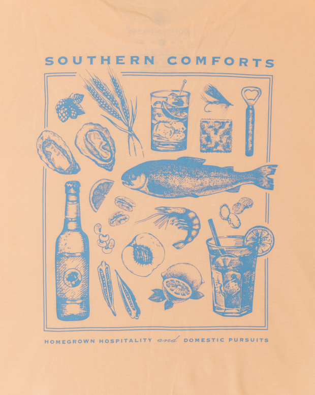 A Southern Comforts SS Tee: Apricot with the Printed Logo of Southern Comforts.