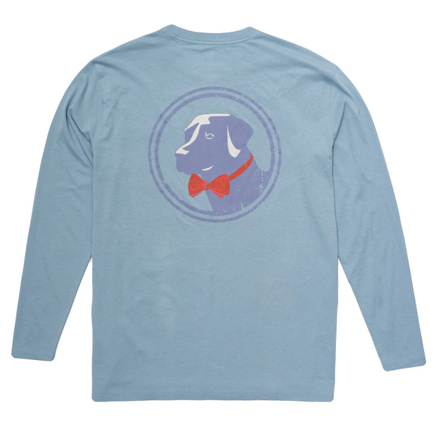 A blue long sleeve crew neck tee with a printed image of a dog wearing a bow tie: Original Logo Red LS Tee.