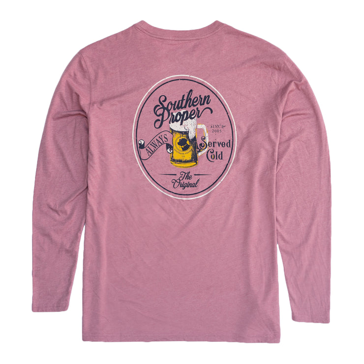 A pink long sleeve Served Cold Long Sleeve Tee made of Peruvian cotton, featuring a yellow logo on the printed front pocket.