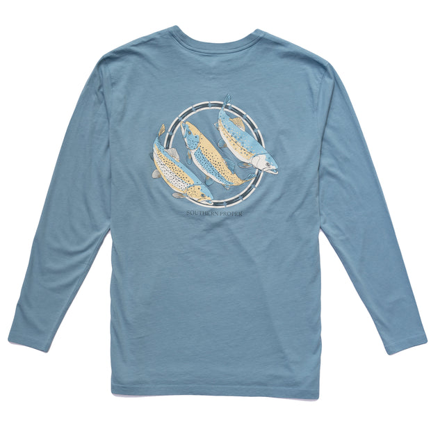 A blue Trout Trio LS Tee with a printed logo of two fish on the front.