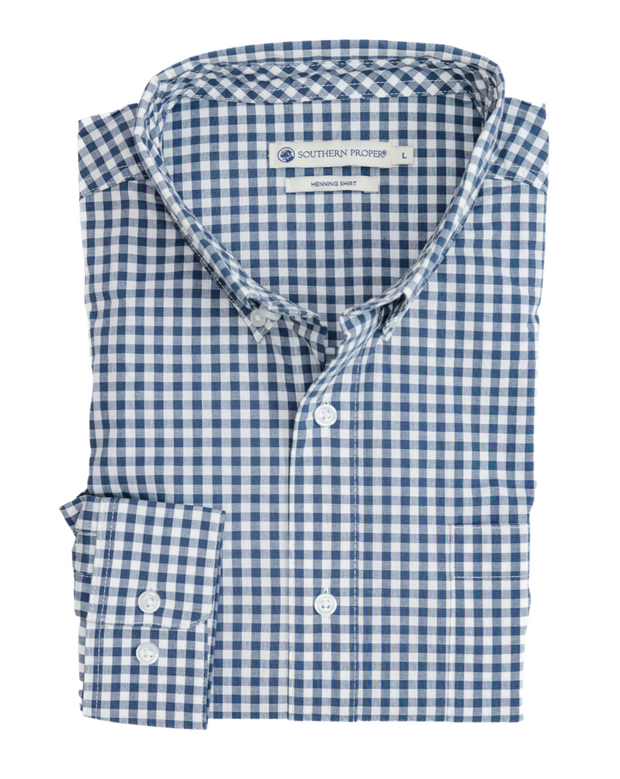 A blue and white gingham shirt on a white background, Henning Shirt: St. Charles.