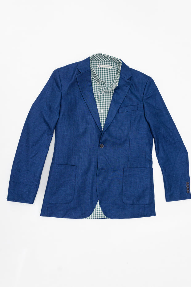 A Classic Unlined Gentleman's Jacket in blue, featuring contrast details, on a white background. Product Name: Nashville