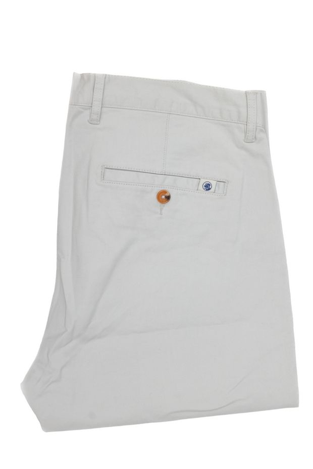 A pair of Thomasville pants with an orange button.