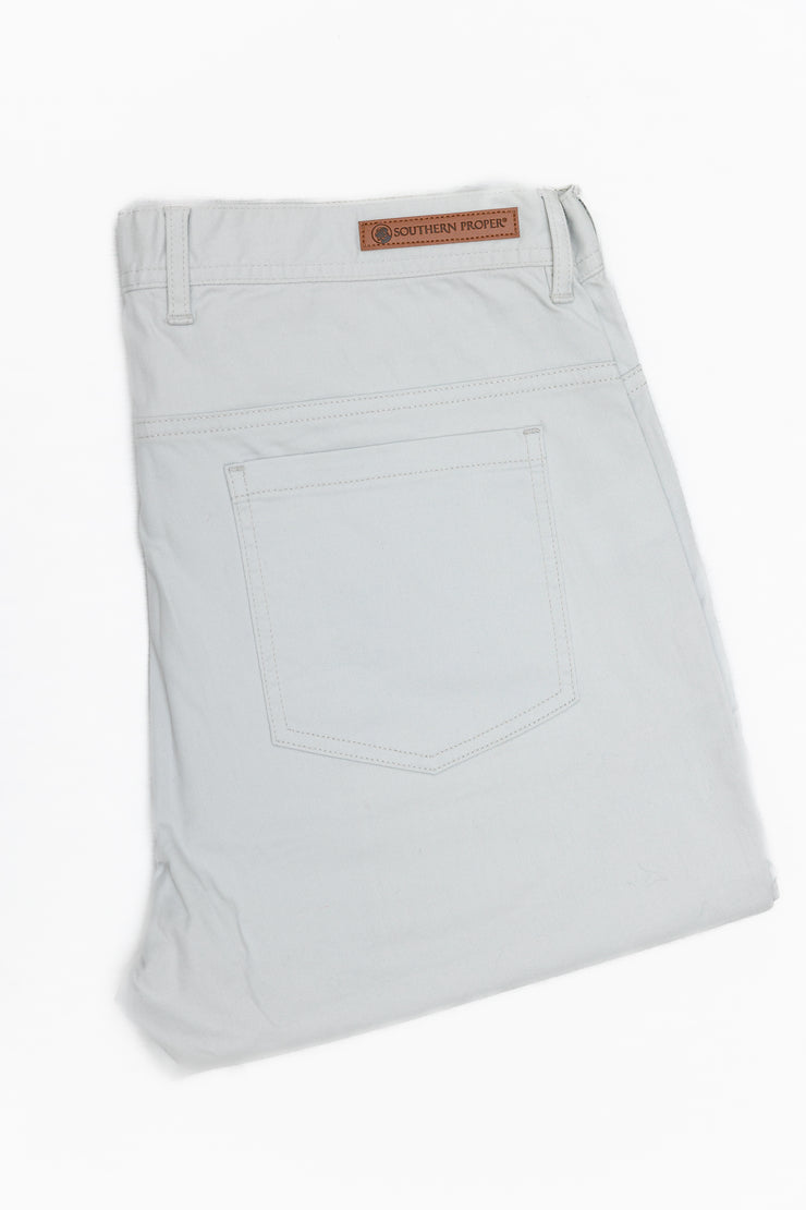 A pair of Needle Creek Five Pocket Pants with a Classic Straight Leg on a white surface.