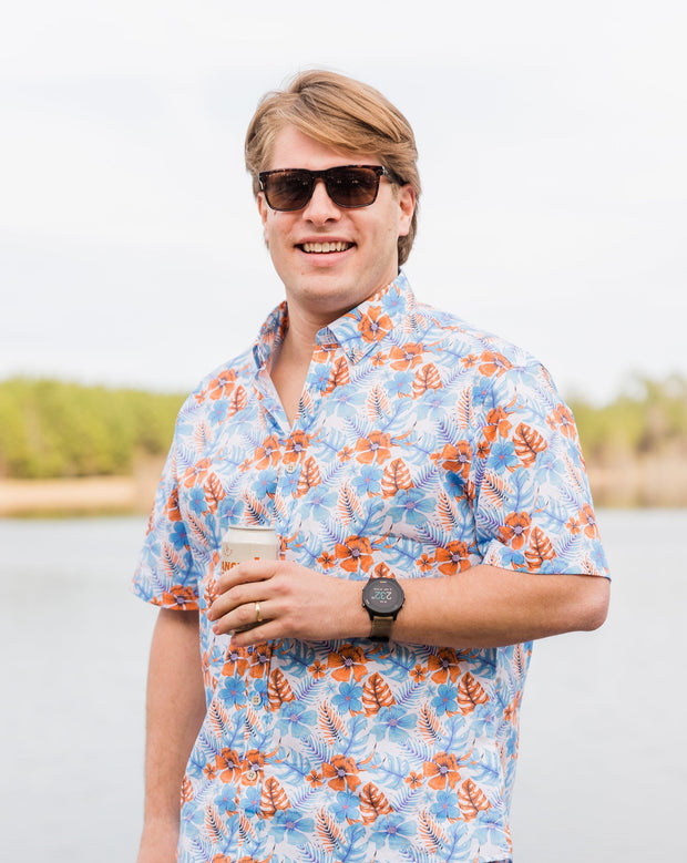 A young man wearing a Cocktail Shirt: Key West and sunglasses.