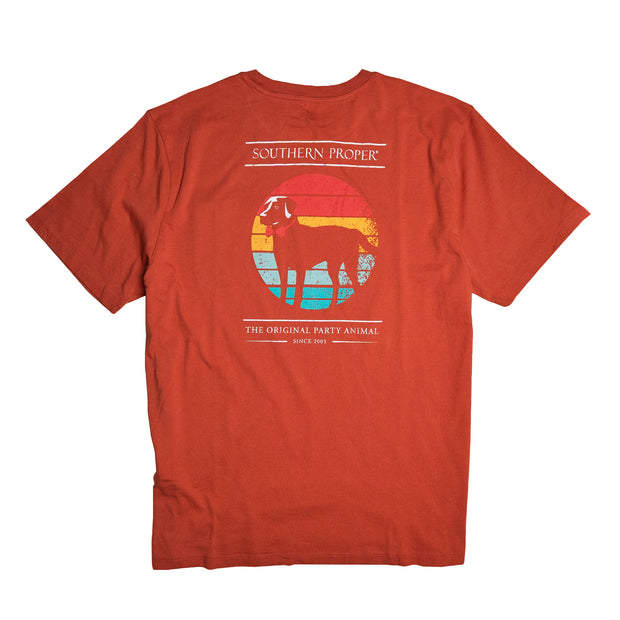 A Retro Dog SS Tee with a red color and a short sleeve, featuring an image of a dog.