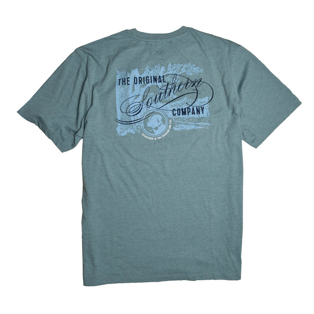 A teal Original Southern Co SS Tee with the printed logo of 'the saltwater company' on it.