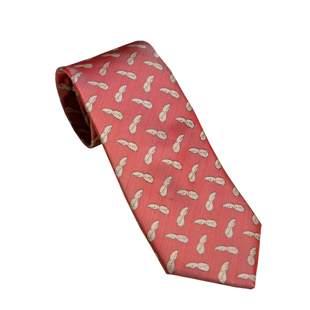 An SP Necktie - Peanut with a Southern Proper touch, featuring a red tie adorned with a pair of shoes.