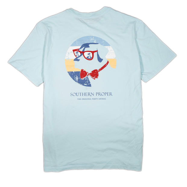 A light blue Short Sleeve Tee: Retro Shade Dog with an image of a dog wearing glasses.