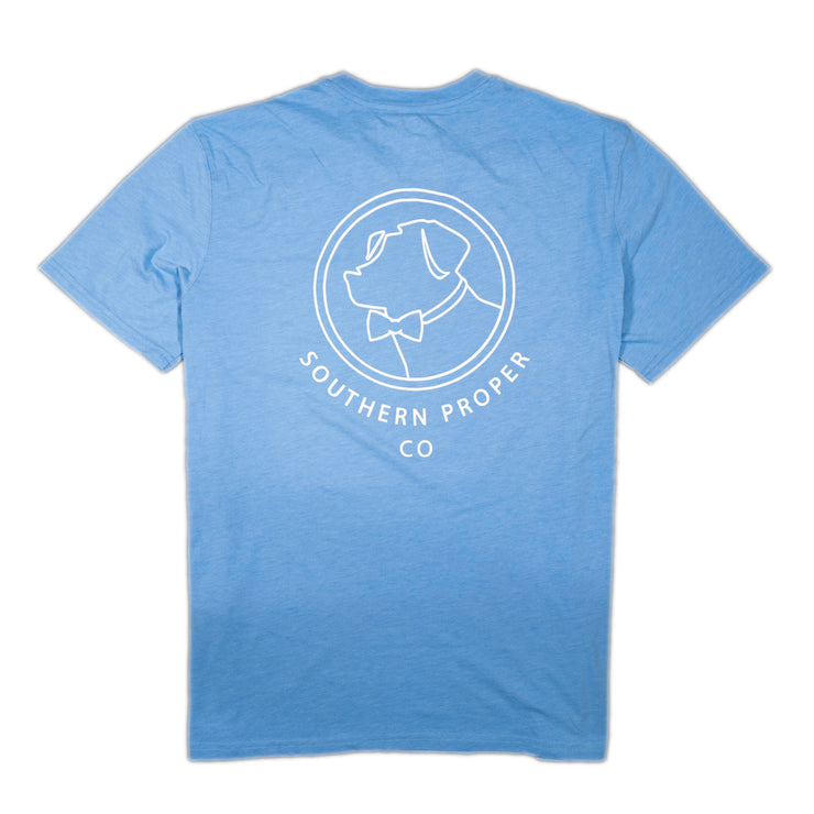 A light blue Line Lab SS Tee with a white dog on it, made from a Peruvian cotton blend.